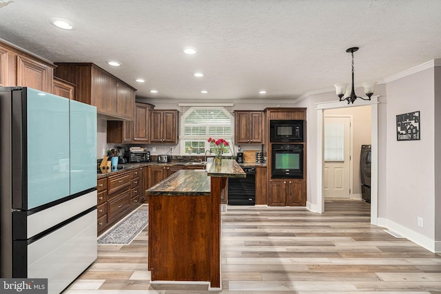 16155 Kerby Dr, Orange, VA 22960 - kitchen with black appliances, ornamental molding, light wood finished floors, baseboards, and recessed lighting