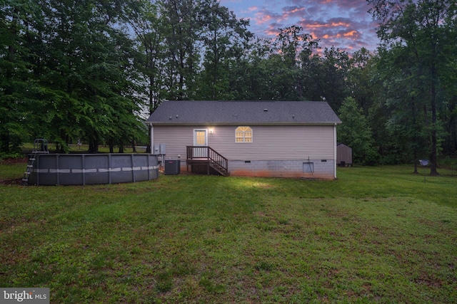 16155 Kerby Dr, Orange, VA 22960 - back of house featuring crawl space, cooling unit, a yard, and an outdoor pool