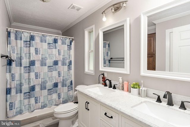 16155 Kerby Dr, Orange, VA 22960 - full bath with toilet, double vanity, ornamental molding, wood finished floors, and a textured ceiling