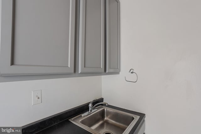 1101 Saint Paul St Unit 606, Baltimore, MD 21202 - detailed view of gray cabinetry and a sink