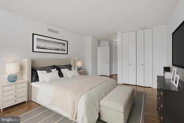 1101 Saint Paul St Unit 606, Baltimore, MD 21202 - bedroom featuring dark wood-style floors and a closet
