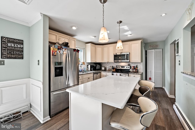 19 Buckwalter Rd, Audubon, PA 19403 - kitchen featuring stainless steel appliances, a baseboard radiator, a center island, dark wood-style flooring, and decorative backsplash