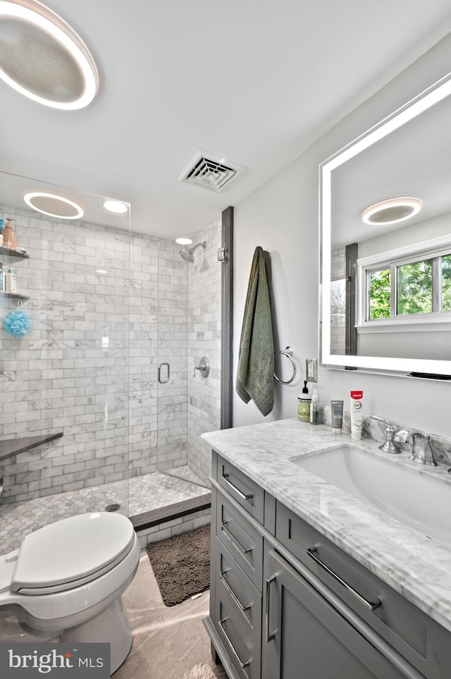 19 Buckwalter Rd, Audubon, PA 19403 - bathroom with a stall shower, toilet, vanity, and tile patterned floors