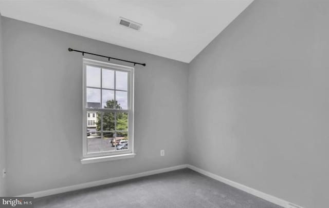 empty room with carpet flooring and baseboards