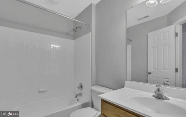 full bathroom with toilet, vanity, and bathing tub / shower combination