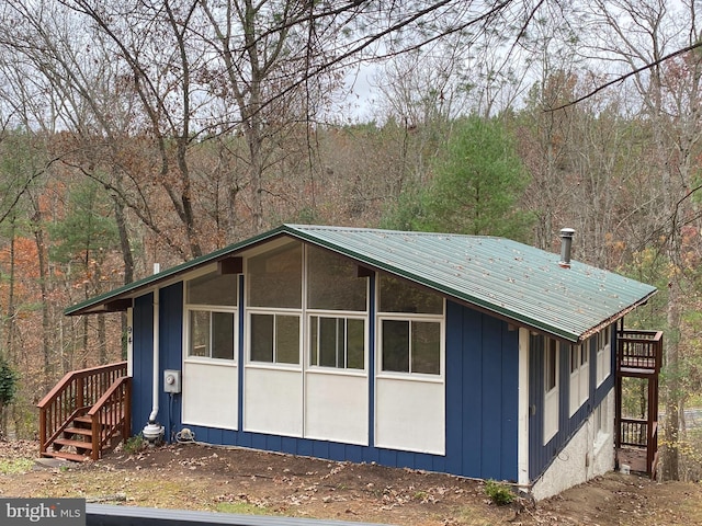 94 Deer Trl, Mount Jackson, VA 22842 - view of home's exterior with a wooded view and metal roof