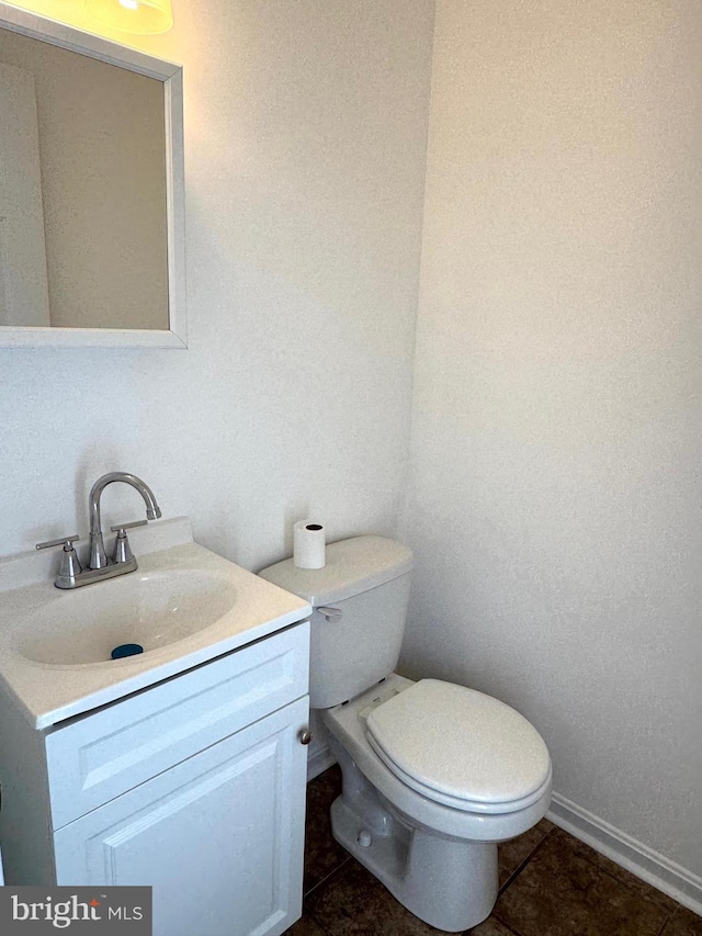 326 Banbury Ter, Winchester, VA 22601 - half bathroom featuring vanity, toilet, tile patterned floors, and baseboards