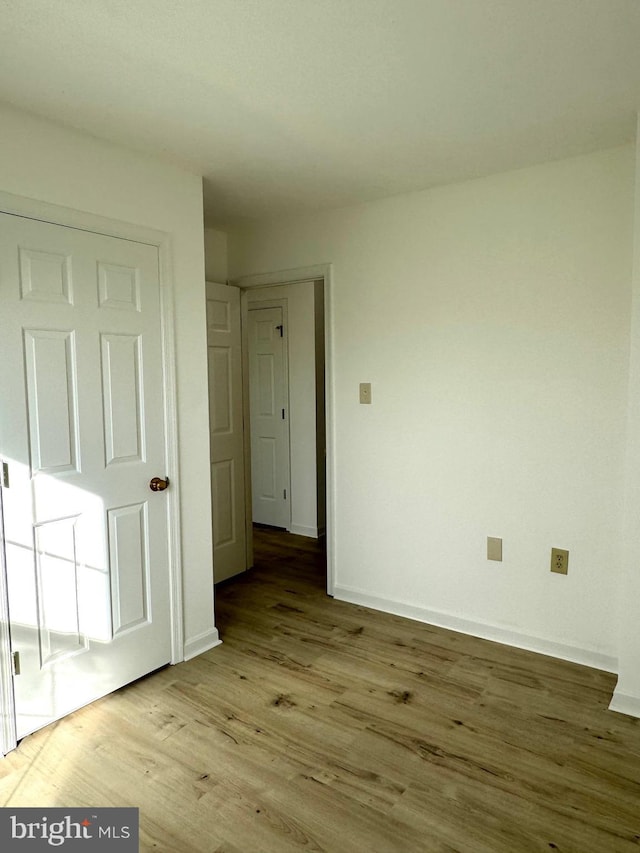 326 Banbury Ter, Winchester, VA 22601 - unfurnished bedroom with wood finished floors and baseboards