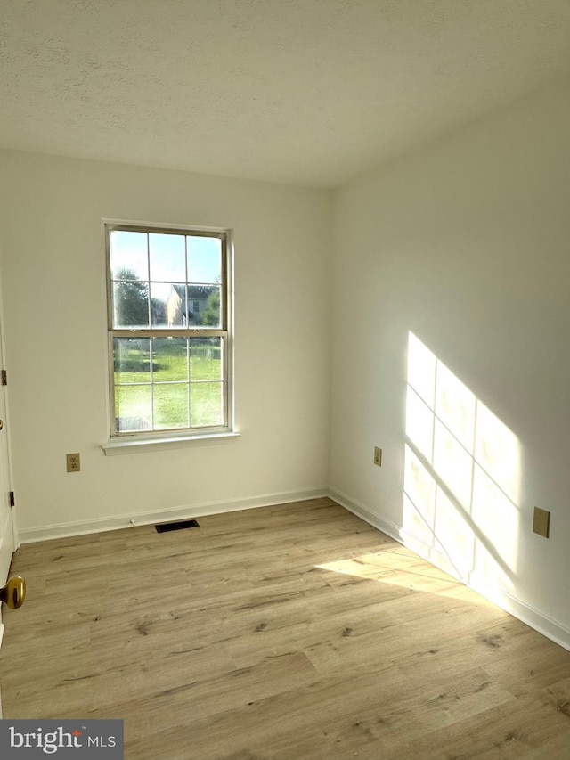 326 Banbury Ter, Winchester, VA 22601 - spare room featuring baseboards and wood finished floors