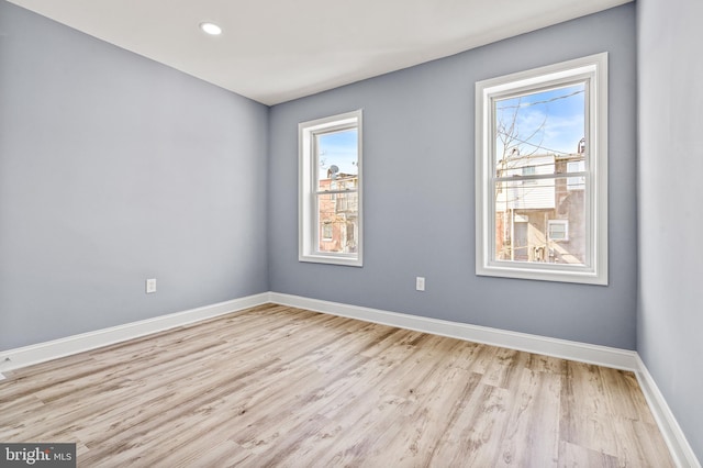 818 N Rose St, Baltimore, MD 21205 - unfurnished room featuring wood finished floors, baseboards, and recessed lighting