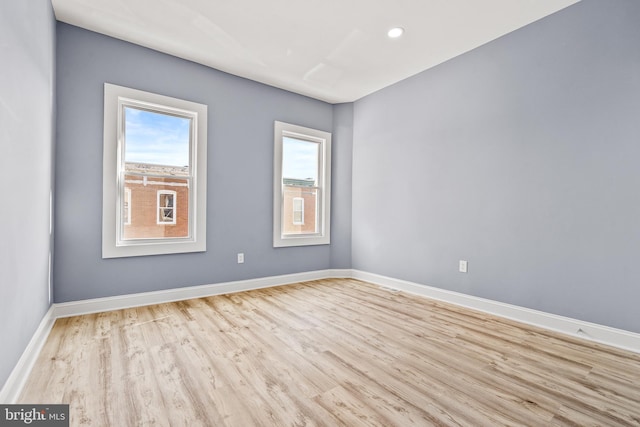 818 N Rose St, Baltimore, MD 21205 - unfurnished room featuring wood finished floors, baseboards, and recessed lighting