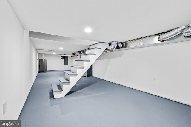 818 N Rose St, Baltimore, MD 21205 - finished below grade area with recessed lighting, electric panel, and stairway