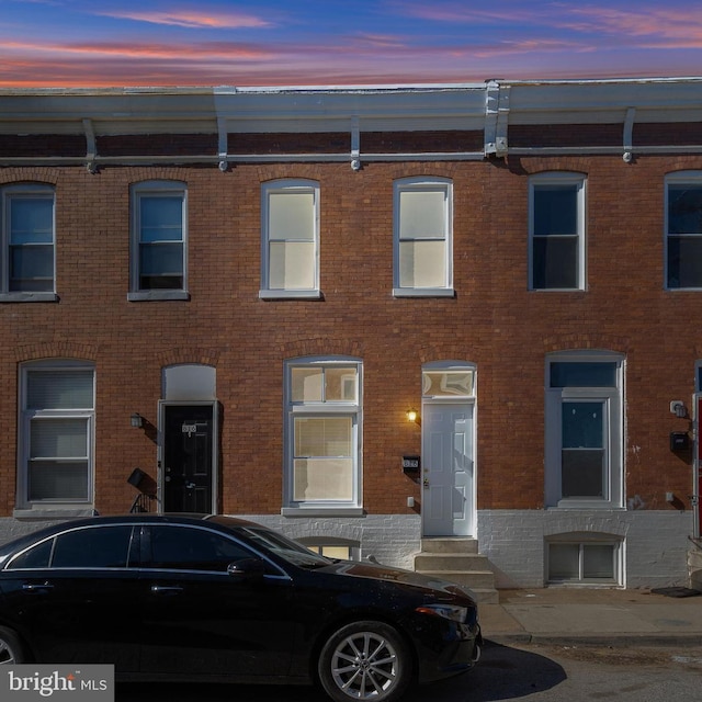 818 N Rose St, Baltimore, MD 21205 - view of property with brick siding and entry steps