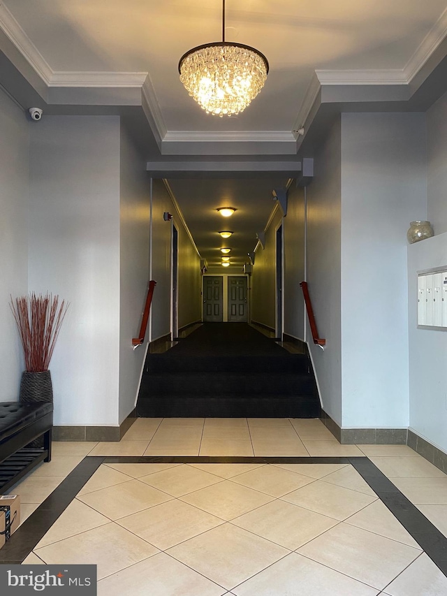 1858 California St NW Unit 33, Washington, DC 20009 - hall featuring tile patterned floors, inlaid floor details, ornamental molding, and a chandelier