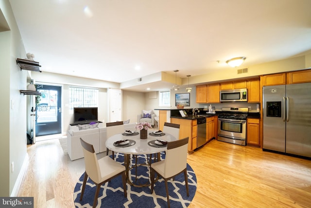 2510 Ontario Rd NW Unit 1, Washington, DC 20009 - dining space with light wood-style flooring, plenty of natural light, and recessed lighting