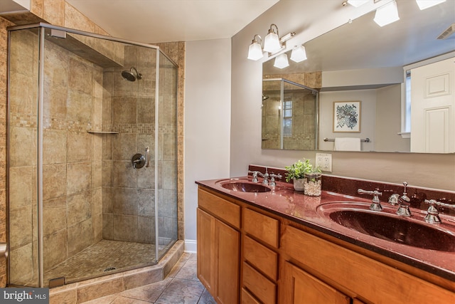 2510 Ontario Rd NW Unit 1, Washington, DC 20009 - full bath with a stall shower, double vanity, and tile patterned floors