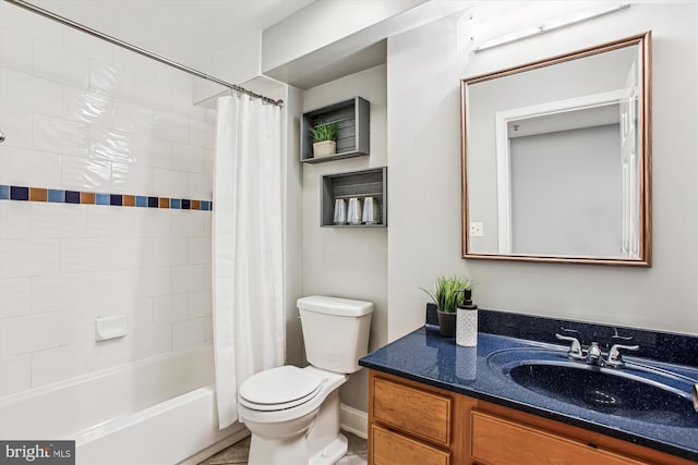 2510 Ontario Rd NW Unit 1, Washington, DC 20009 - bathroom featuring toilet, vanity, shower / bath combo, and baseboards
