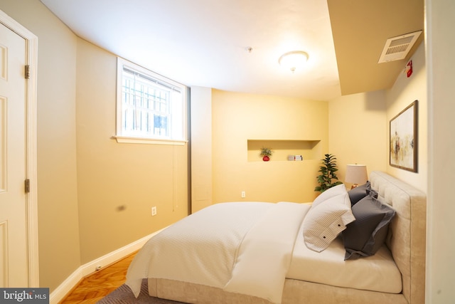2510 Ontario Rd NW Unit 1, Washington, DC 20009 - bedroom with wood finished floors and baseboards