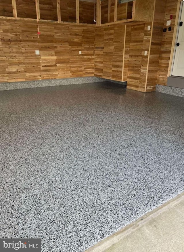 503 Dugout Dr, Lanoka Harbor, NJ 08734 - detailed view of speckle patterned floor and wooden walls
