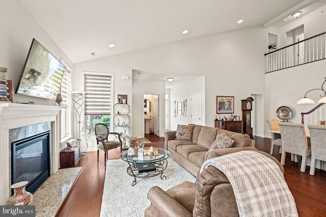 1255 Webb Dr, Perkasie, PA 18944 - living room with dark wood-type flooring, high vaulted ceiling, recessed lighting, and a high end fireplace