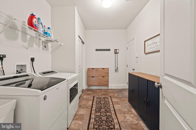 1255 Webb Dr, Perkasie, PA 18944 - laundry area featuring separate washer and dryer and stone finish flooring