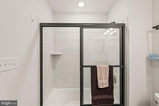 1255 Webb Dr, Perkasie, PA 18944 - bathroom with toilet and combined bath / shower with glass door