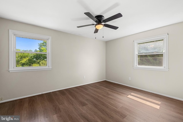 12516 Castleleigh Pl, Silver Spring, MD 20904 - empty room featuring healthy amount of natural light, wood finished floors, and baseboards
