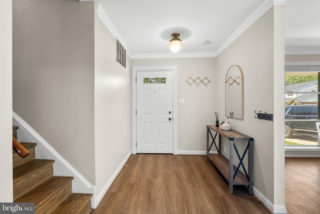 12516 Castleleigh Pl, Silver Spring, MD 20904 - entrance foyer featuring wood finished floors, ornamental molding, baseboards, and stairway