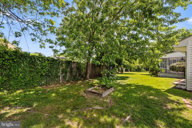 12516 Castleleigh Pl, Silver Spring, MD 20904 - view of yard with a sunroom and a garden