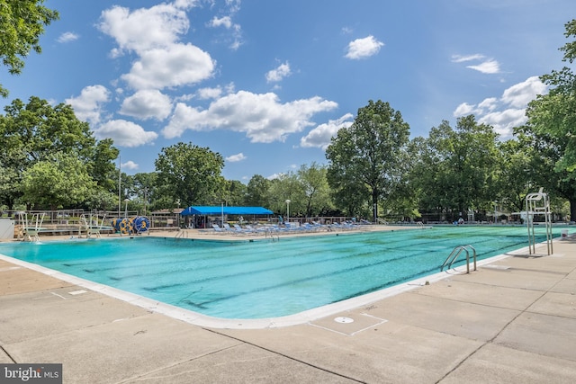 12516 Castleleigh Pl, Silver Spring, MD 20904 - community pool featuring view of scattered trees and a patio