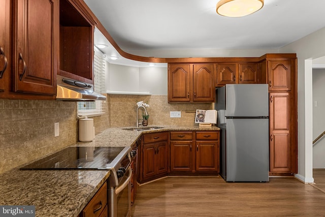 12516 Castleleigh Pl, Silver Spring, MD 20904 - kitchen featuring stainless steel appliances, a sink, open shelves, ventilation hood, and wood finished floors