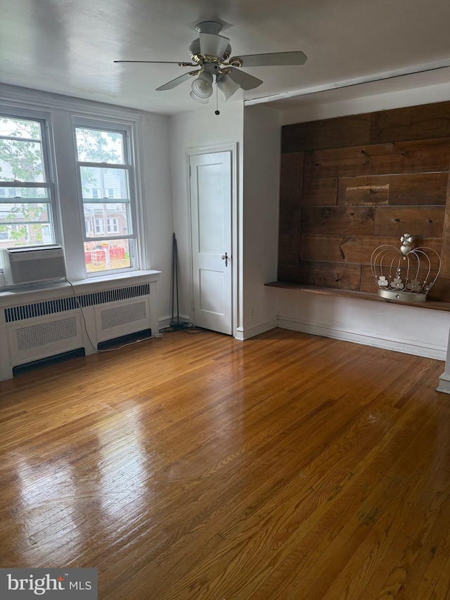 3100 Fanshawe St, Philadelphia, PA 19149 - spare room featuring radiator, a ceiling fan, and wood finished floors