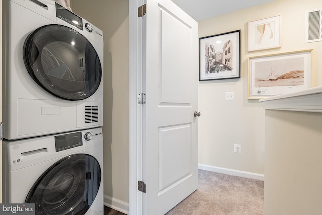 311 Sandy Bottom Cir Lot 127Quincy, Ranson, WV 25438 - clothes washing area with estacked washer and dryer, baseboards, and carpet floors