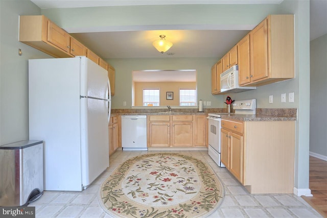113 Westpoint Dr, Carlisle, PA 17013 - kitchen featuring white appliances, light brown cabinets, and a sink