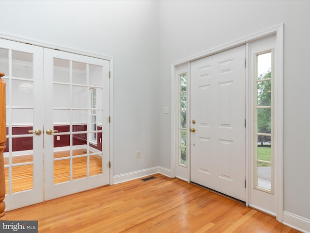 2411 Windwood Dr, Winchester, VA 22601 - entrance foyer featuring wood finished floors, baseboards, and french doors