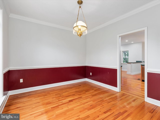2411 Windwood Dr, Winchester, VA 22601 - spare room featuring light wood-style flooring, crown molding, baseboards, and a chandelier