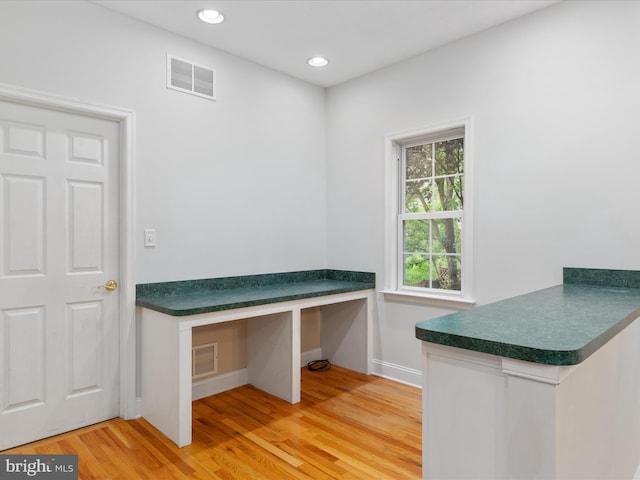 2411 Windwood Dr, Winchester, VA 22601 - unfurnished office featuring built in desk, baseboards, light wood-type flooring, and recessed lighting