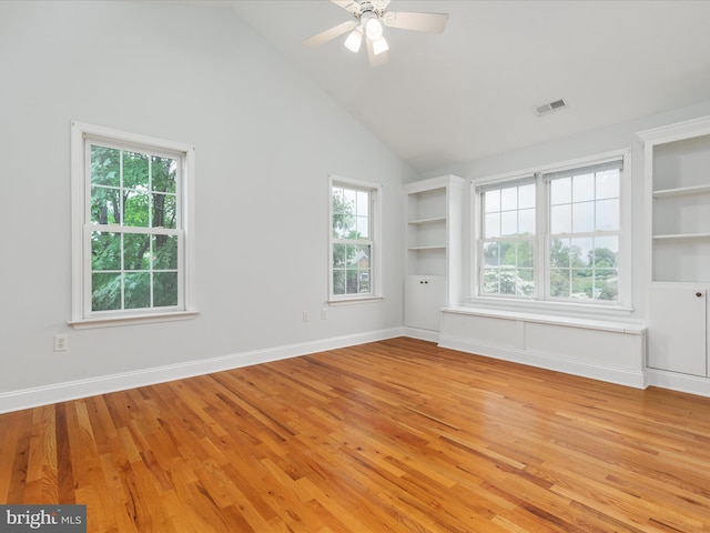 2411 Windwood Dr, Winchester, VA 22601 - empty room with light wood-style floors, healthy amount of natural light, a ceiling fan, and high vaulted ceiling