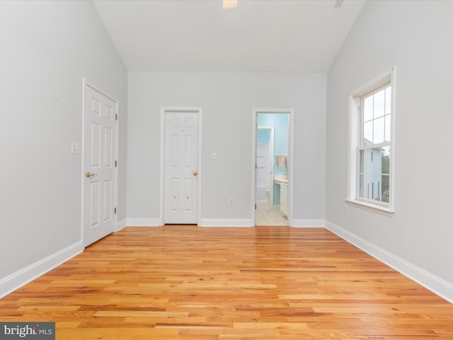 2411 Windwood Dr, Winchester, VA 22601 - unfurnished bedroom featuring light wood-style flooring, baseboards, and ensuite bathroom