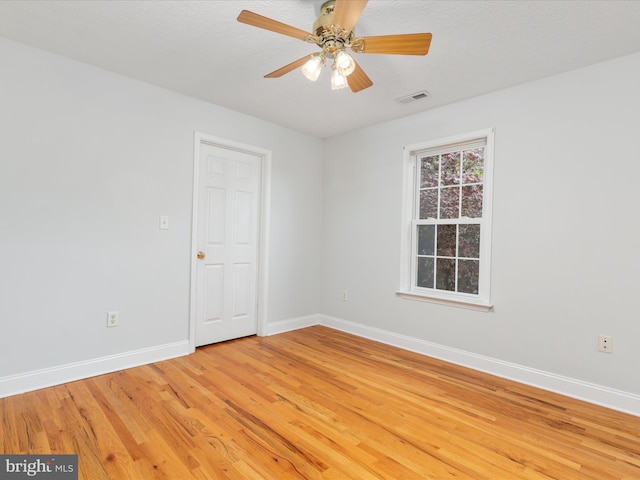 2411 Windwood Dr, Winchester, VA 22601 - unfurnished room featuring baseboards, light wood-style flooring, and ceiling fan