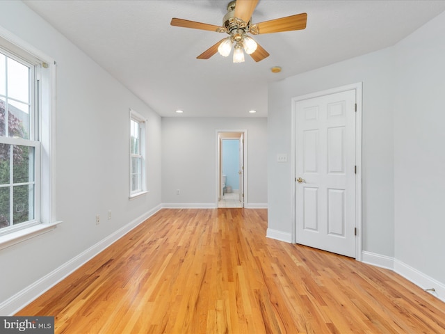 2411 Windwood Dr, Winchester, VA 22601 - empty room featuring plenty of natural light, light wood-style flooring, baseboards, and recessed lighting