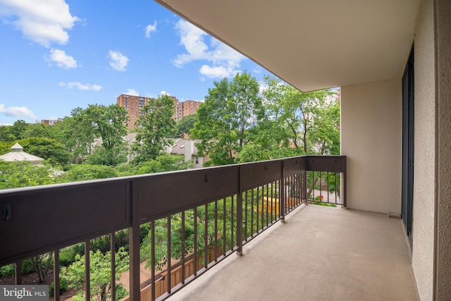 5300 Holmes Run Pkwy Unit 403, Alexandria, VA 22304 - balcony featuring view of scattered trees