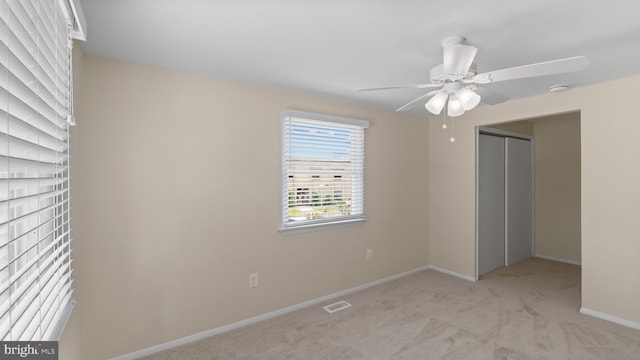 632 Towne Center Dr, Joppa, MD 21085 - unfurnished bedroom with carpet flooring, baseboards, a closet, and ceiling fan
