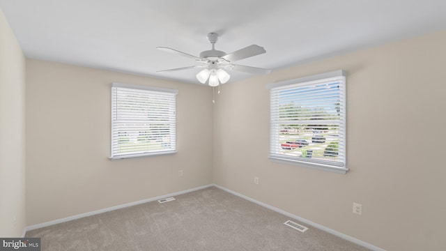 632 Towne Center Dr, Joppa, MD 21085 - carpeted empty room with plenty of natural light, a ceiling fan, and baseboards