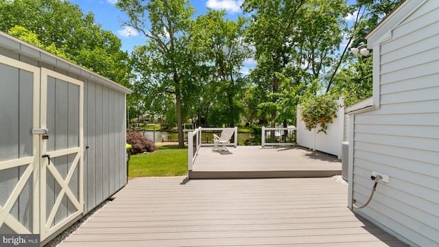 632 Towne Center Dr, Joppa, MD 21085 - wooden terrace featuring a water view and a lawn