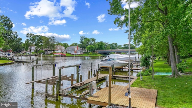 632 Towne Center Dr, Joppa, MD 21085 - dock featuring boat lift, a water view, and a lawn