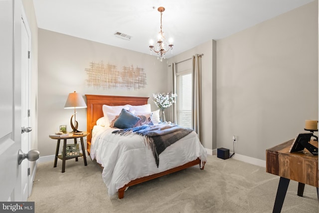 4701 Old Soper Rd Unit 565, Suitland, MD 20746 - bedroom with a chandelier, light carpet, and baseboards