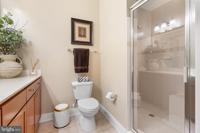 4701 Old Soper Rd Unit 565, Suitland, MD 20746 - full bath featuring toilet, vanity, a stall shower, and tile patterned floors