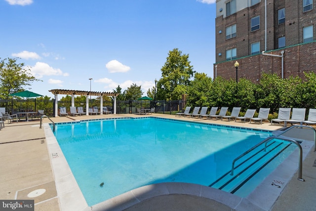 4701 Old Soper Rd Unit 565, Suitland, MD 20746 - community pool featuring a pergola and a patio