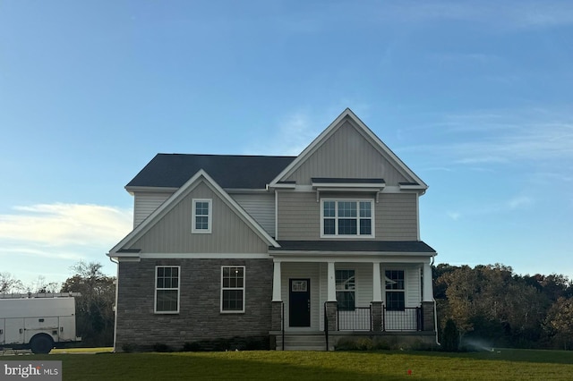 103 New Rd, Tabernacle, NJ 08088 - craftsman house featuring covered porch, stone siding, a front yard, and board and batten siding
